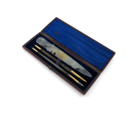 A 19th century silver-gilt mounted moss agate pen set, the mounts possibly Indian, comprising two dip pens, with foliate moun