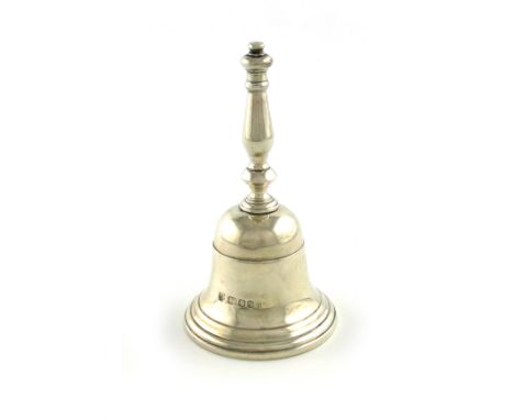 A modern silver table bell, by R. Comyns, London 1966, conventional form, baluster handle, height 10.8cm, approx. weight 5oz.