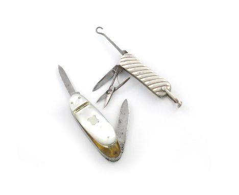 A Victorian silver penknife, by Saunders and Shepherd, London 1899, rounded rectangular form, with fluted decoration, with a 