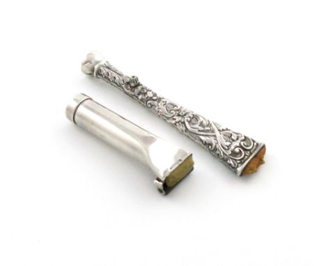 An Edwardian silver stamp moistener, by Grey and Co., Birmingham 1901, tapering flattened cylindrical form, embossed foliate 