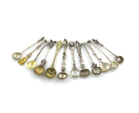 A collection of twelve antique silver salt spoons, comprising: a George III silver-gilt one by Edward Farrell, London 1819, c