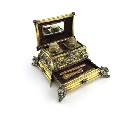 A George IV silver-gilt inkstand casket, by Alexander J. Strachan, London 1829, the inkwells and instruments unmarked, rectan