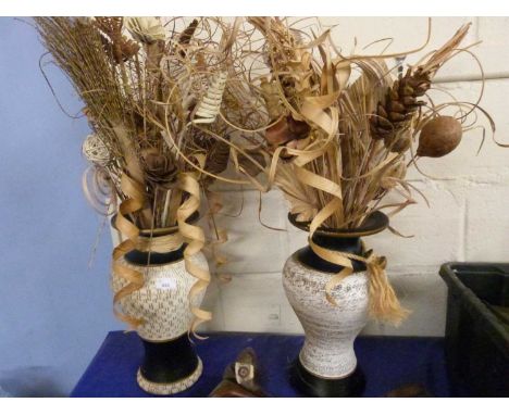 Two modern ceramic vases and a quantity of various dried leaves and flowers