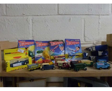 Matchbox Thunderbirds toys together with further toy vans and lorries