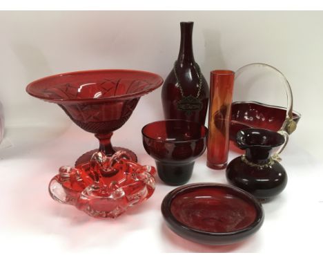 A collection of ruby and red glass items comprising a basket, vases etc. NO RESERVE