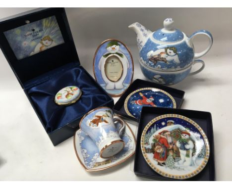 Snowman items including Border Fine Arts enamel pill box, teapot and bowl, enamel teacup and saucer, photo frame and two othe
