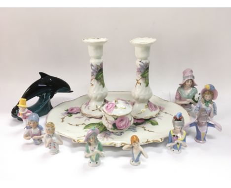 A collection of china pin dolls, dressing table set and a Poole dolphin. NO RESERVE