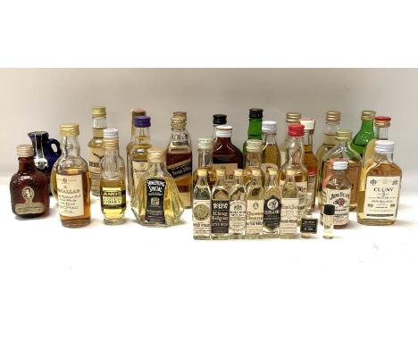 A collection of miniature Whiskys including a vintage 10 year old Macallan single malt. 27 plus the smaller miniature edition