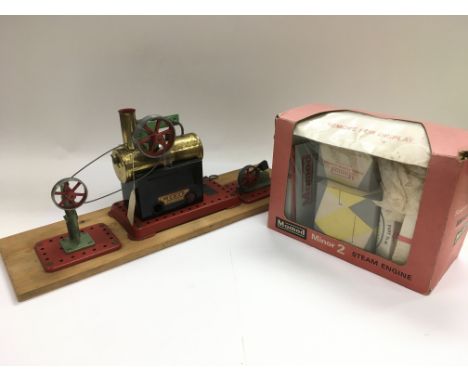 A Mamod Minor 2 steam engine with boxed accessories.