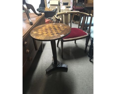 An Early Victorian games occasional table the circular top inlaid with a chess board and a pair of Edwardian tub chair (3)