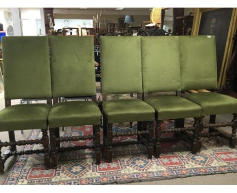 A set of five oak dining chairs with green upholstery backs and seats on bobbin turned legs no reserve.