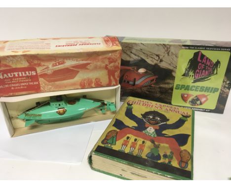 A Vintage Walt Disney clockwork tin plate Nautilus in a fitted box almost as new with clockwork key a Vintage Daily Express C