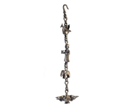 A BRONZE HANGING LAMP, DECCAN, SOUTHERN INDIA, 19TH CENTURY the circular oil reservoir with seven wick holders, hanging from 