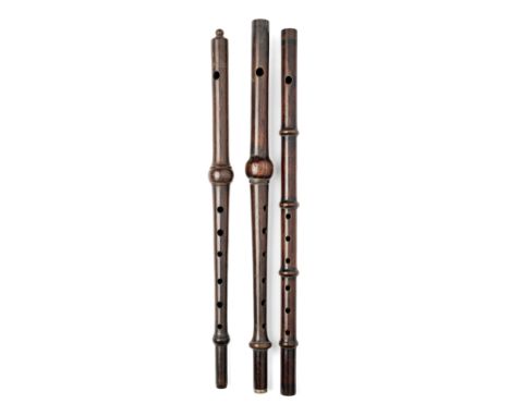 *THREE WOODEN FLUTES (GHOR BAANSURI), NEPAL, 19TH/20TH CENTURY each with six finger holes and a slightly larger mouth hole, o