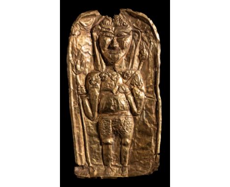 A JAVANESE GOLD REPOUSSE RELIEF PLAQUE, INDONESIA, CIRCA 14TH CENTURY of arched form, the base slightly concave, depicting a 