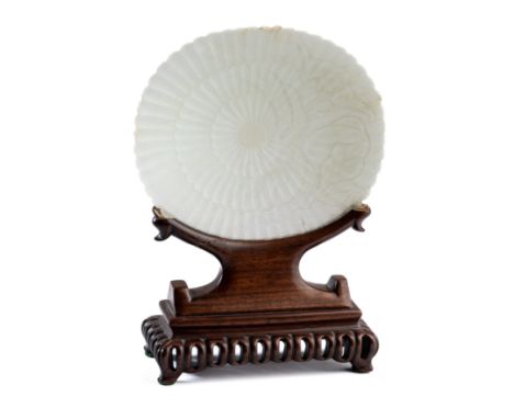 A CHINESE MUGHAL STYLE WHITE JADE 'CHRYSANTHEMUM' DISH, 19TH CENTURY finely carved to the interior with three concentric band