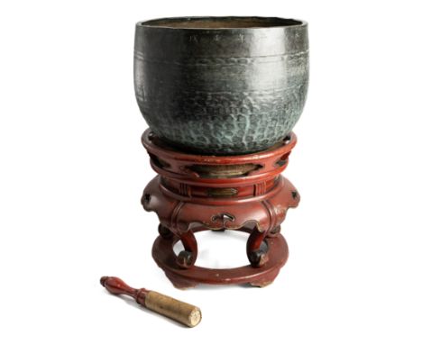 *A CUP GONG (DOBACHI), JAPAN, DATED 1682 A.D. beaten copper alloy, of bowl shaped form, the lower sides with scale motifs in 