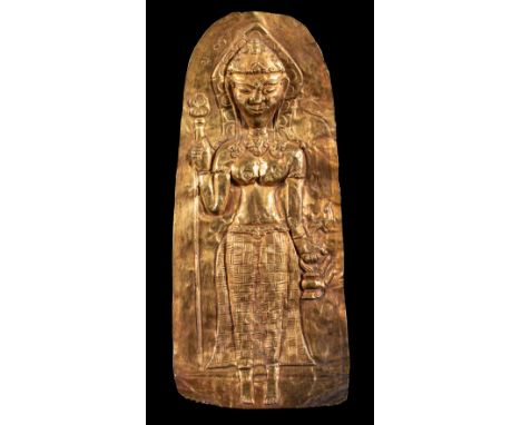 A JAVANESE GOLD REPOUSSE RELIEF PLAQUE, INDONESIA, CIRCA 14TH CENTURY of arched form, the base slightly concave, depicting a 