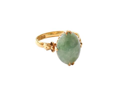 A Jade Ring, the oval cabochon jade in a yellow claw setting, to a fancy shoulder plain polished shank, finger size NStamped 