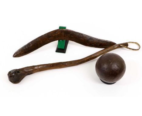 An Australian Aboriginal Boomerang, with stone chiselled decoration, 52.5cm; a Blackthorn Shillelagh, the butt pierced for a 