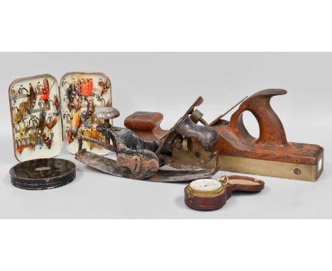 Various Tools and Instruments, including a 1920s metal and wooden steering wheel, brass and wooden plane, a Lewin universal p