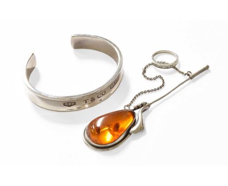 A Quantity of Jewellery, including a diamond pendant, in illusion setting; a Tiffany bangle; a cubic zirconia half hoop ring 