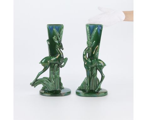Royal Haeger, United States. Group of two Art Deco ceramic "green agate" deer vases, mid-20th century. Each are numbered alon