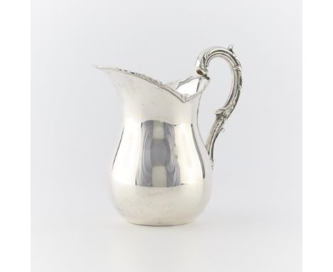 One Peruvian sterling silver pitcher of bulbous form with scrolled edges and handle. Marked along the base Siam 925 Made in P