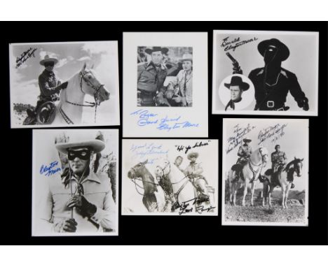 Group of six autographed press photos from the Lone Ranger television show. All signed by Clayton Moore and one signed by bot