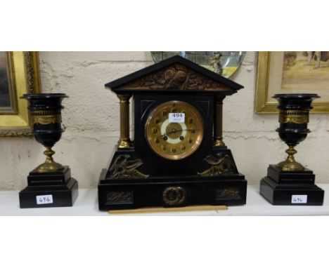 3 Piece Black Marble Clock Set incl. a mantle clock with doric brass columns, the brass dial stamped “Drummond & Co” and a ma