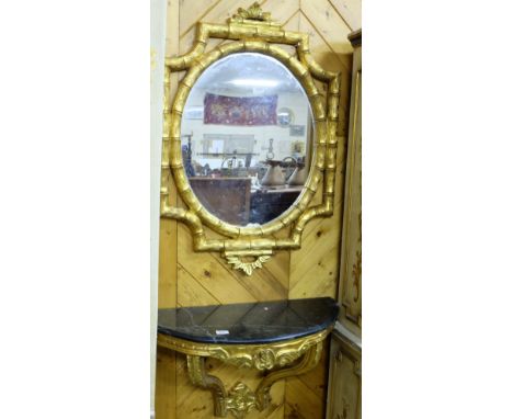 Carved Wood Console Table painted gold, with demi-lune black marble top and a bamboo design overmantle 