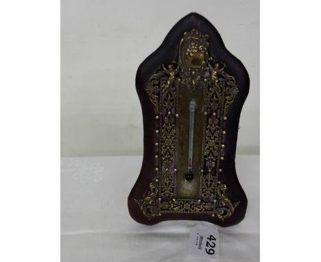 19th C Table Thermometer, brass overlay on a red leather back, 7”h