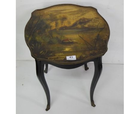 Hand Painted Lamp Table, with country scene, signed by the artist M.R, on sabre legs, 20”h x 15”w