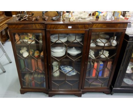 Mahogany floor display cabinet/bookcase with break front, on bracket feet, 3 astragal glazed doors, 5'w x 4' h