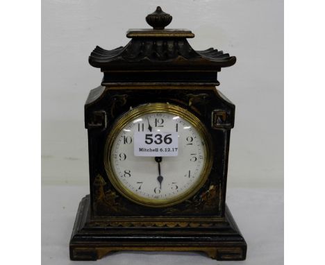 Mantle Clock in a black Japanned Case (wind-up movement), white dial, in the shape of a pagoda, 9”h