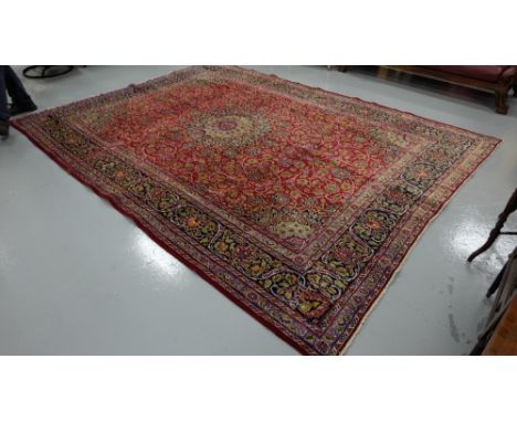 Old red ground Persian Kashan carpet, traditional all-over design, 3.9x 2.95m