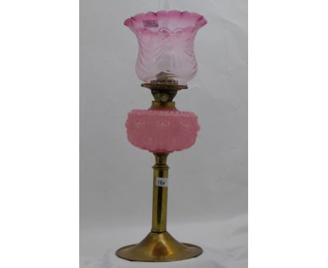 Victorian Oil Lamp, brass base with tulip shaped red glass shade and a pink glass bowl