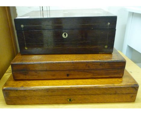 A mid 19thC mother-of-pearl inlaid rosewood workbox with a hinged lid and straight sides  4.5''h  12''w; and two later oak ca