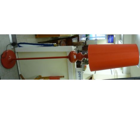 A vintage style red painted metal standard lamp with a fabric shade  52''h overall       SL