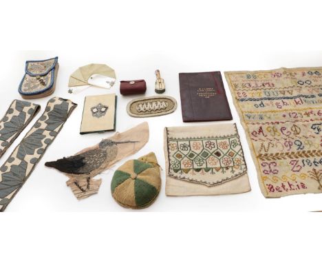 A Group of Assorted Textiles and Sewing Accessories, comprising a 19th century unframed alphabet sampler worked by Bettie Pea