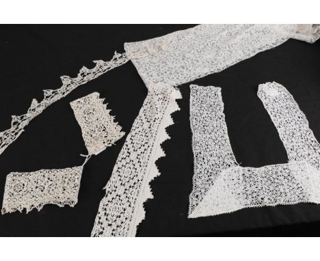 Late 16th Century Flemish and Italian Lace, comprising a pair of cuffs with alternating floral and star motifs, 42cm by 10cm;