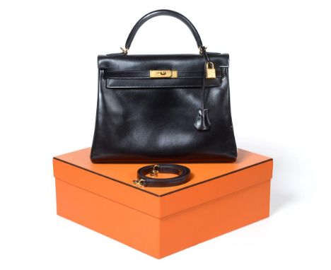 Hermès 'Kelly' Black Leather Handbag, 2008, with double strap closure of twist lock, with single carry handle and also a deta
