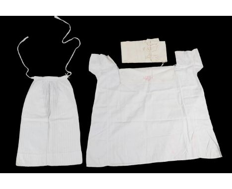 19th Century Costume Accessories, comprising a white cotton ribbed pocket; white cotton infants binder, inscribed in ink 'Rad