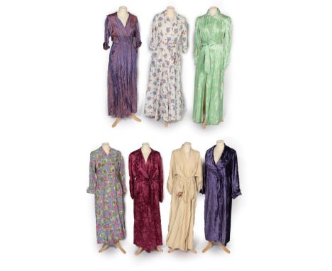 Group of 1930's-1950's Housecoats, comprising a raspberry sateen type example patterned with bouquets, gathered patch pockets