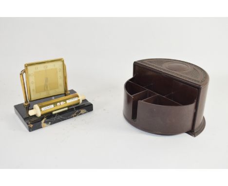 SMALL BOX CONTAINING A FRENCH CLOCK AND CALENDAR ON BLACK ONYX BASE