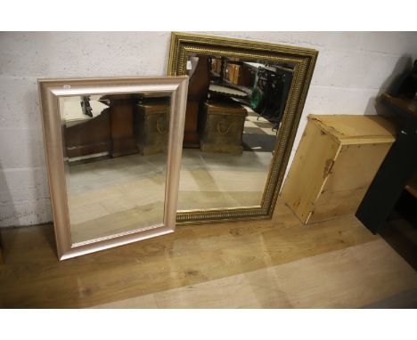 Two Large Onate Mirrors with Bevelled Glass . Largest Measures 42 x 30 inches. See photos. This item is not suitable for post