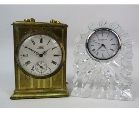 Small Vintage brass mechanical mantle clock by Astral plus a Quartz crystal clock by Waterford.