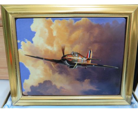 Lovely framed ceramic picture of a WW2 Hurricane by Adrian Rigby.  Comes with silk and foam lined box and was sold on behalf 