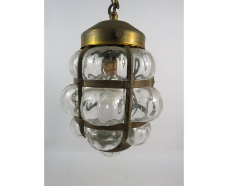Vintage moulded bubble glass and brass lantern. 10.5" long.
