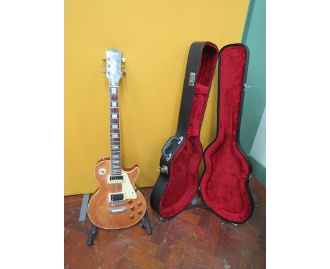 Copy of a Gibson, Les Paul Type Marc Bolan 4777 with Natural wood front and Wine Coloured body to rear. Mother of Pearl Inlay